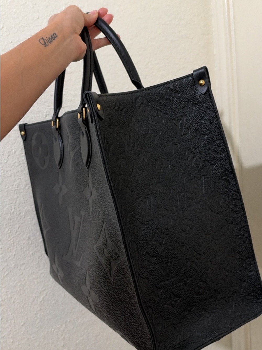 Louis Vuitton Black Monogram Embossed Tote with Gold Accents